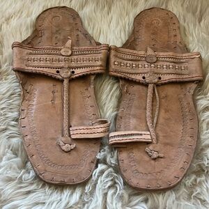 Leather sandals never worn.
